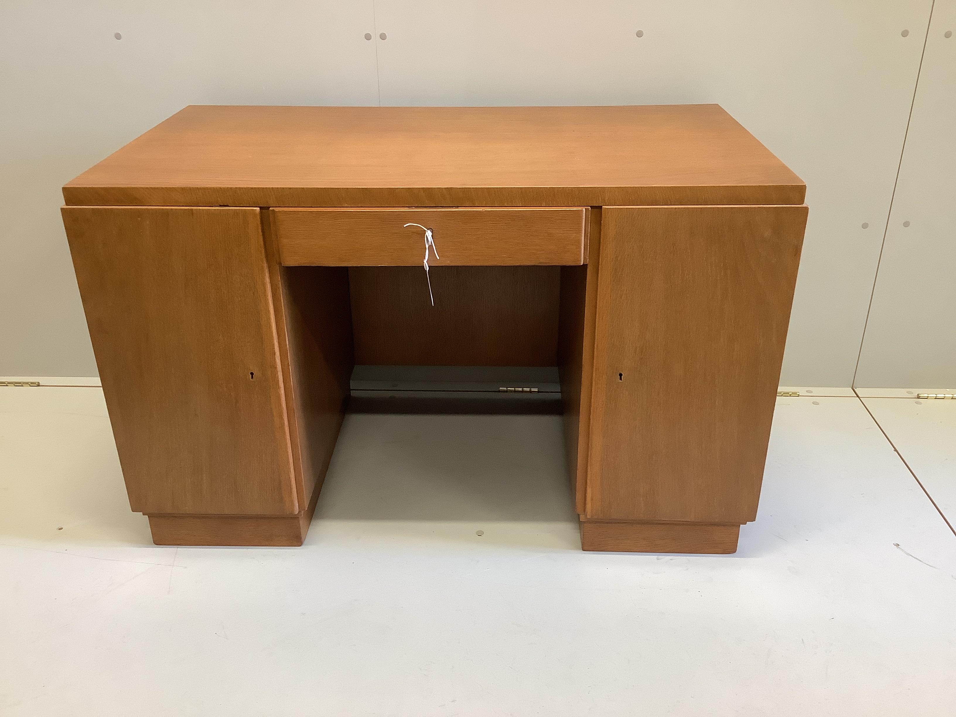 A mid century French oak kneehole desk, width 120cm, depth 64cm, height 76cm